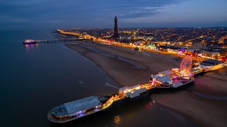 Blackpool pleasure beach illuminated at night