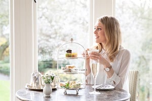 Woman having afternoon tea