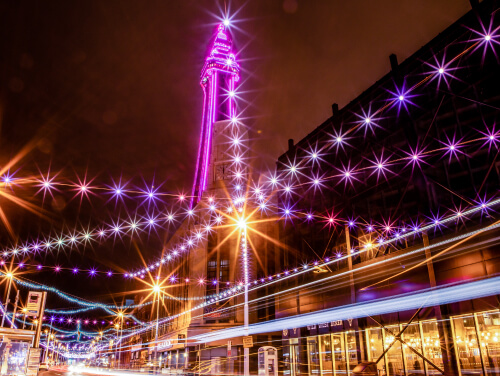 Blackpool Tower illuminated by pink lights