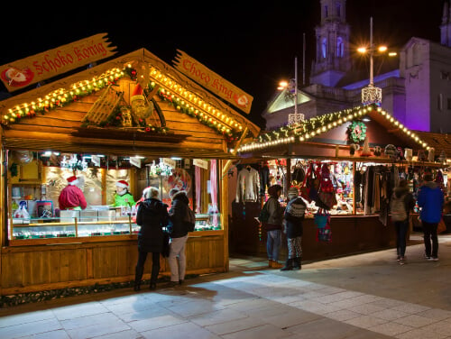 Leeds Christmas market stalls in the evening