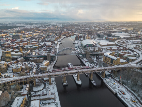 Aerial view of Newcastle covered in snow