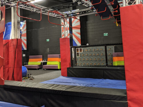 An indoor obstacle course with padding all over it.