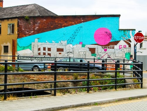 A colourful graffiti wall in Sheffield on a cloudy day