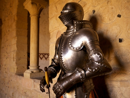 A full body suit of armour in a museum