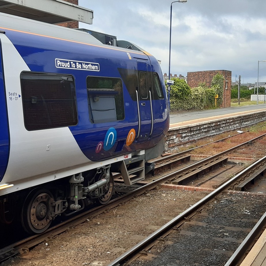 Images shows Northern train with Proud to be Northern banner