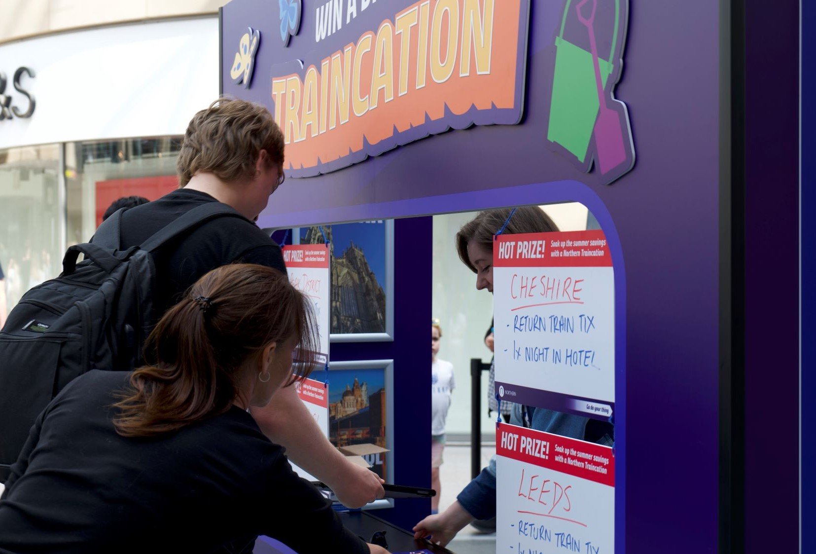 image-shows-pop-up-travel-agency-at-trinity-leeds-promoting-traincations-close-up