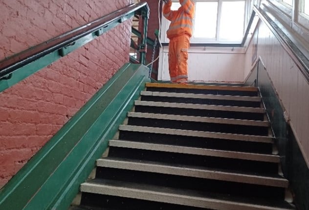 this-image-shows-a-volunteer-at-filey-station