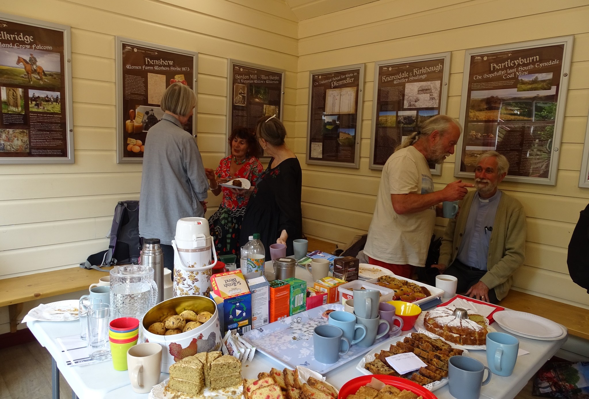 this-image-shows-community-members-enjoying-the-new-exhibition-at-haltwhistle-station