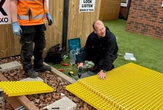 this-images-shows-the-heaton-team-installing-the-crossing