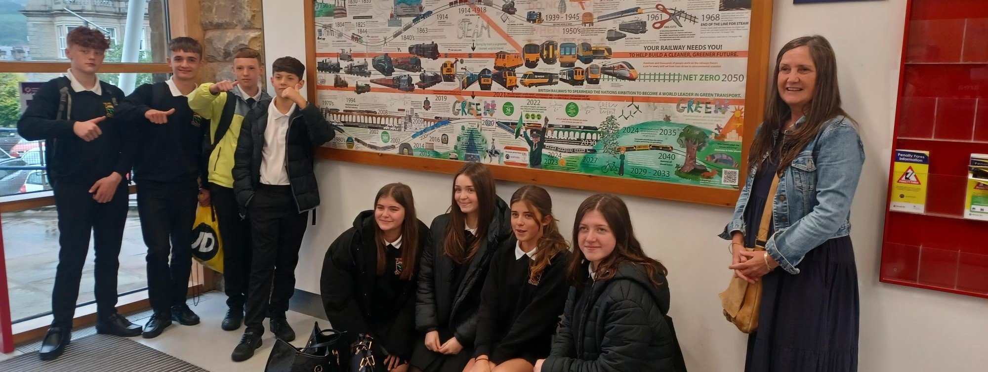 image-shows-karen-allerton-with-students-from-the-hollins-secondary-school