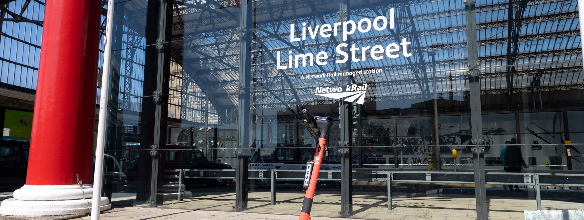 image-shows-voi-scooter-outside-liverpool-lime-street-station