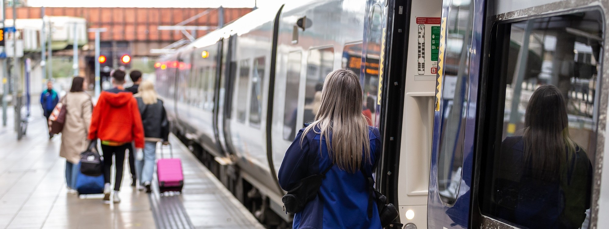 image-shows-a-family-boarding-a-northern-train