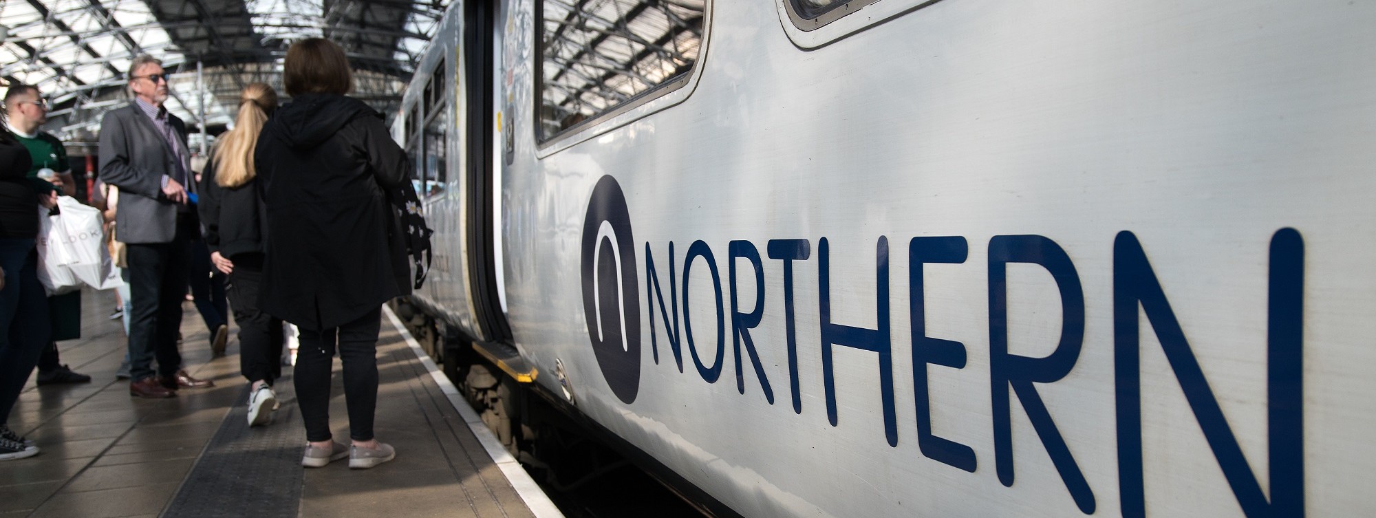 image-shows-commuters-boarding-a-northern-train