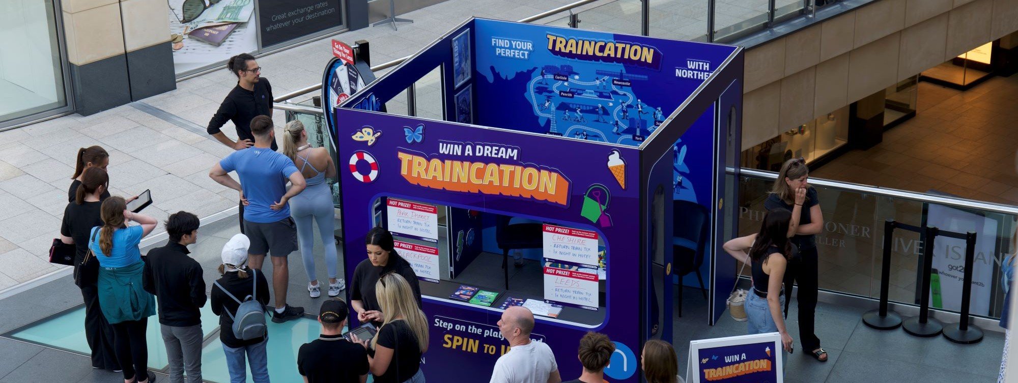 image-shows-pop-up-travel-agency-at-trinity-leeds-promoting-traincations-2