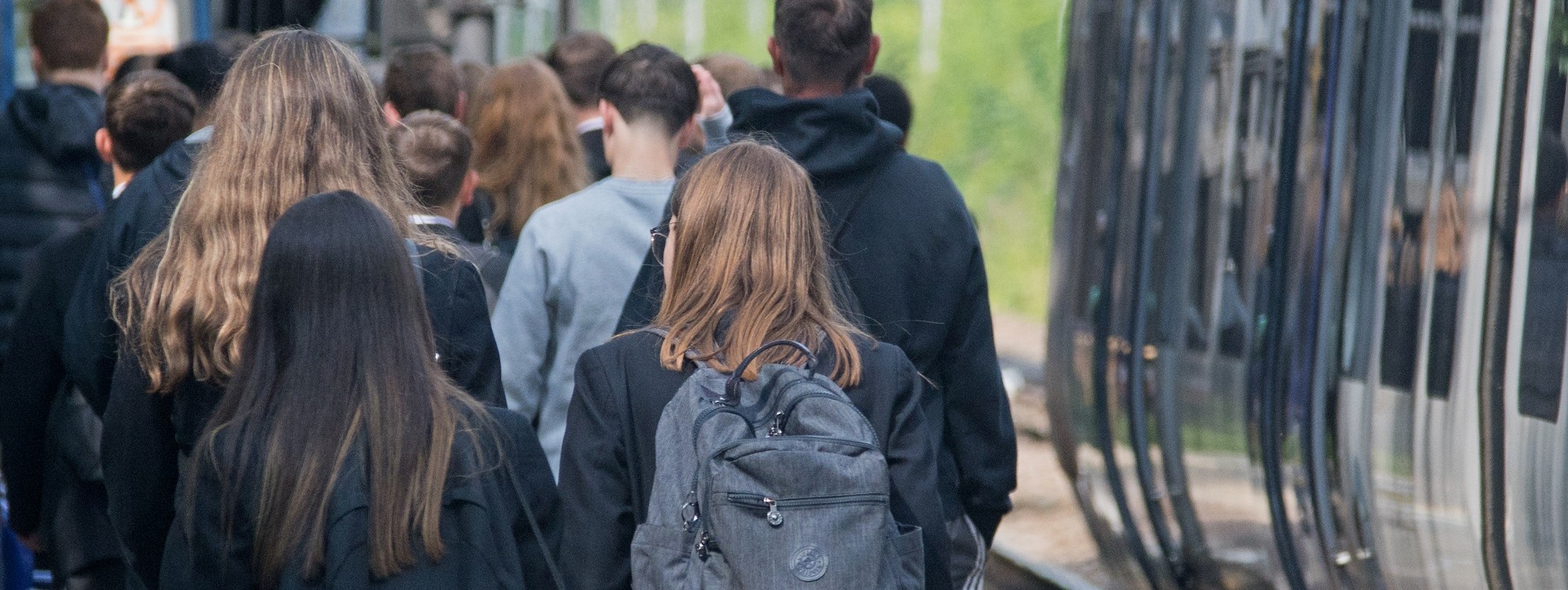 image-shows-schoolchildren-alongside-a-northern-train-at-a-platform