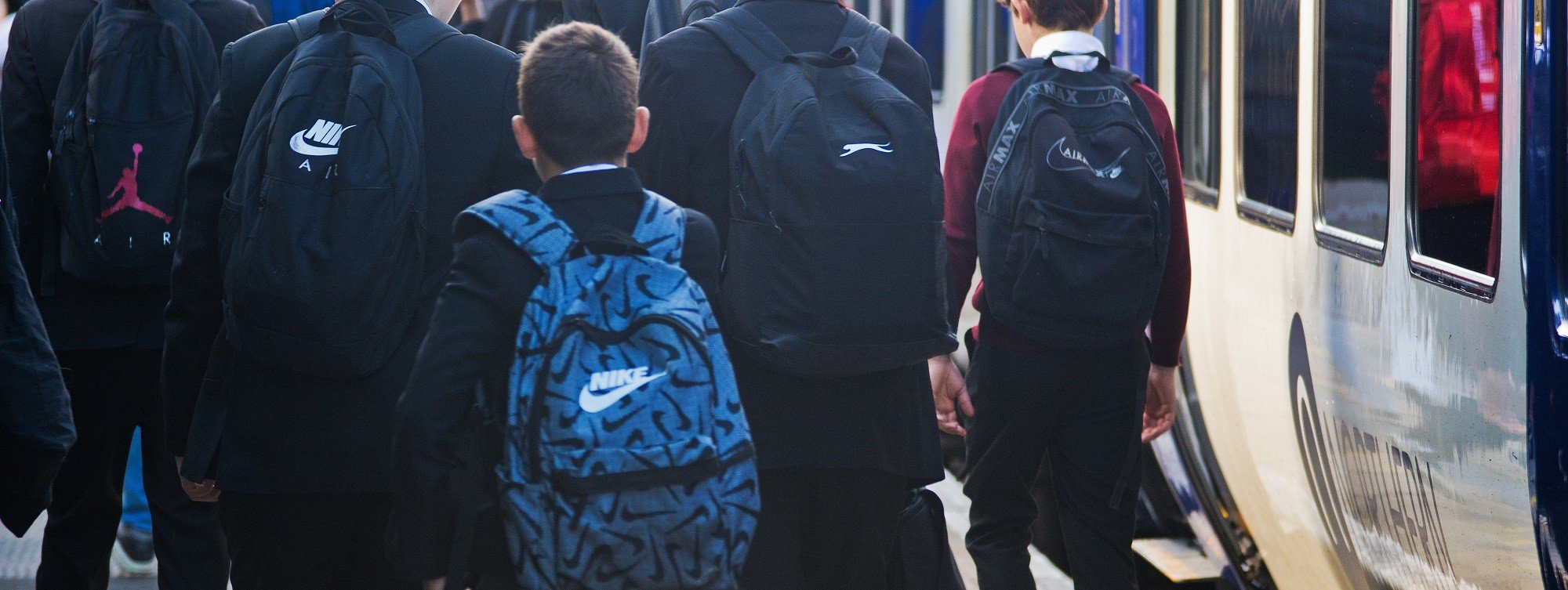 image-shows-schoolchildren-disembarking-a-northern-train