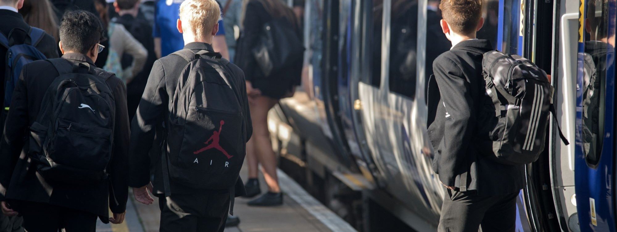 image-shows-secondary-school-students-commuting-to-school