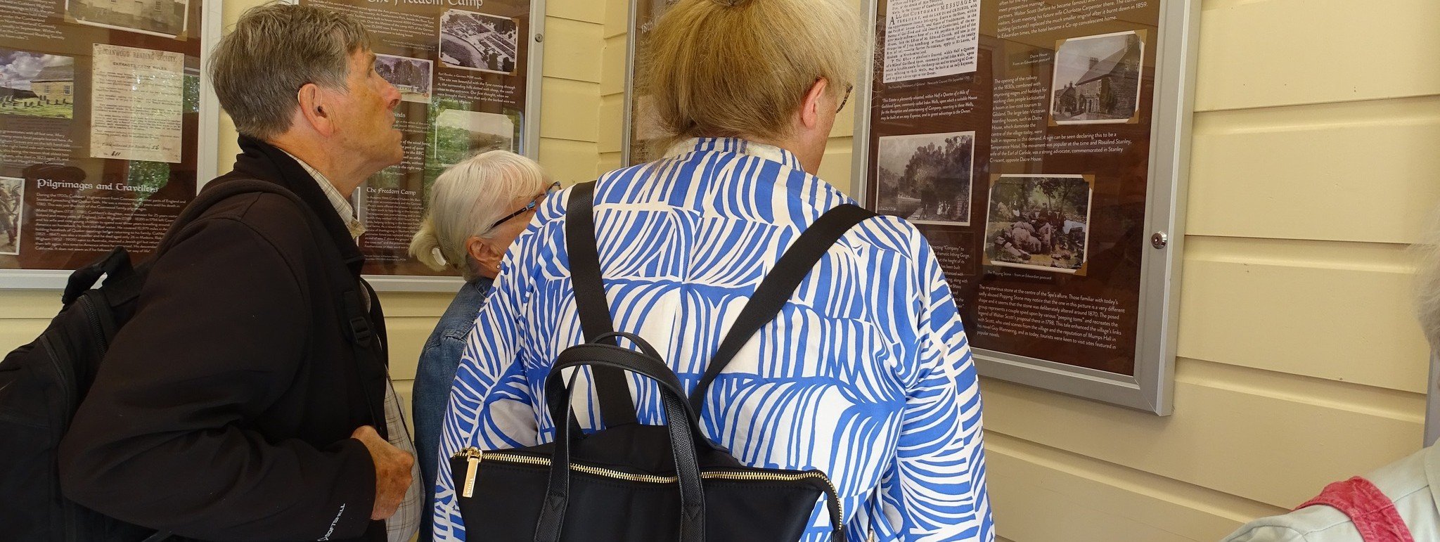 this-image-shows-community-members-enjoying-the-new-exhibition-at-haltwhistle-2