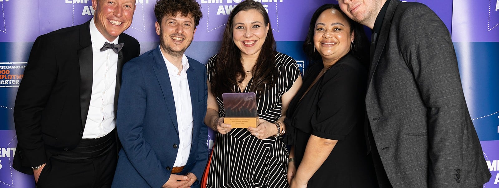this-image-shows-the-northern-team-holding-their-award