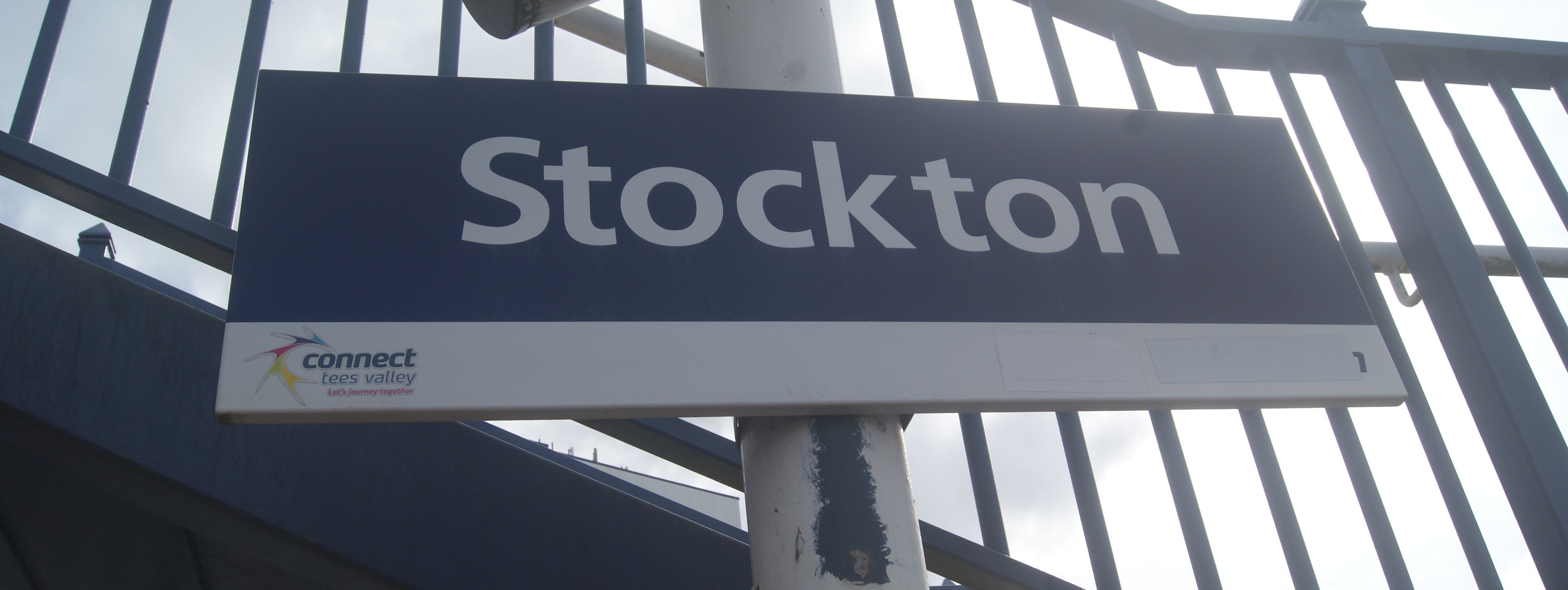 this-image-shows-the-blue-and-white-stockton-station-sign