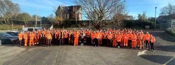 Image shows colleagues bidding farewell to Graham Hamlett oiozx-ep0we-e53o3-ej0uo-92a4n