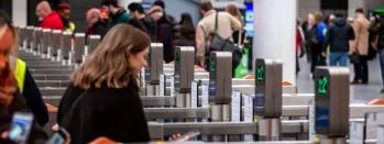 Image shows customer at ticket gateline image-shows-customer-at-ticket-gateline