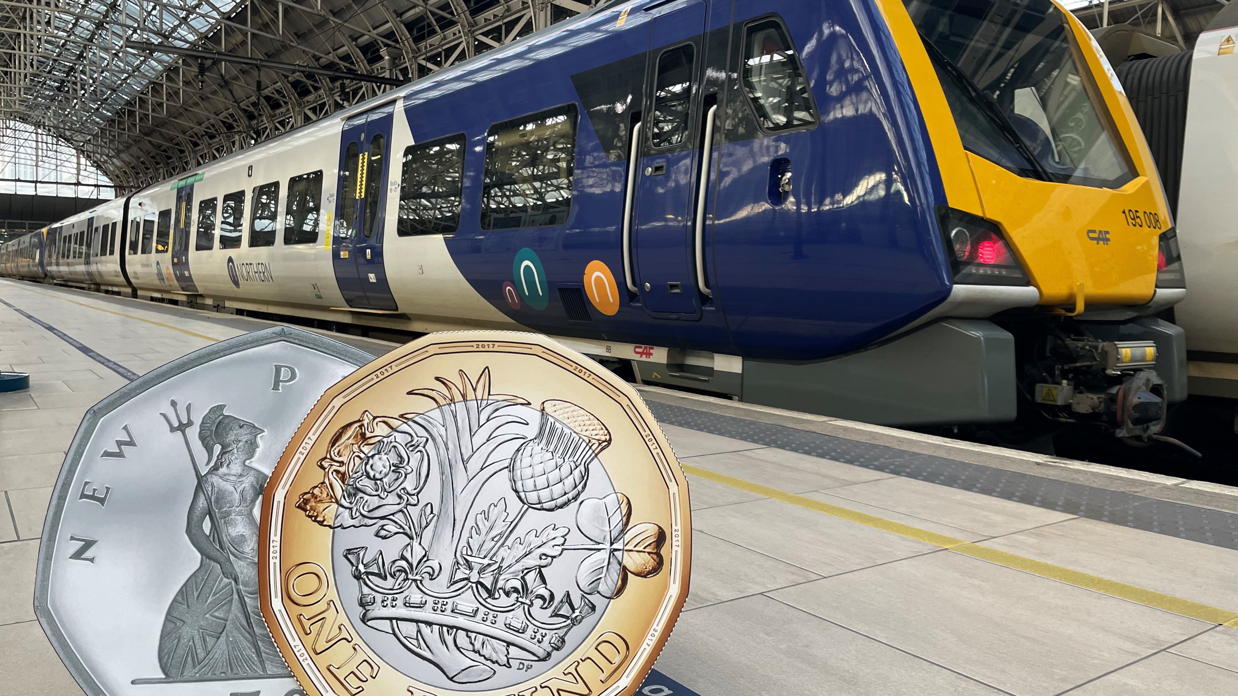 Image shows 50p & £1 coin as part of Northern Flash Sale - January 2023