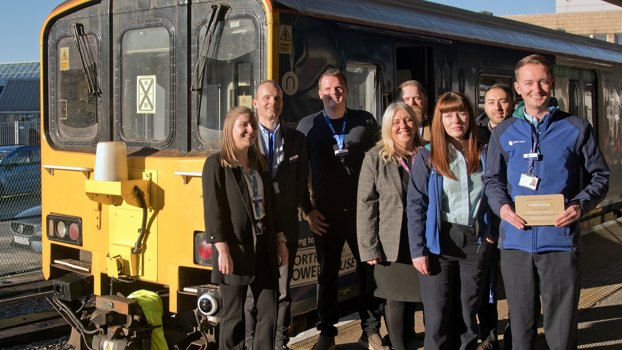 Image shows Northern's Intelligent Trains concept train with staff at Bradford Interchange