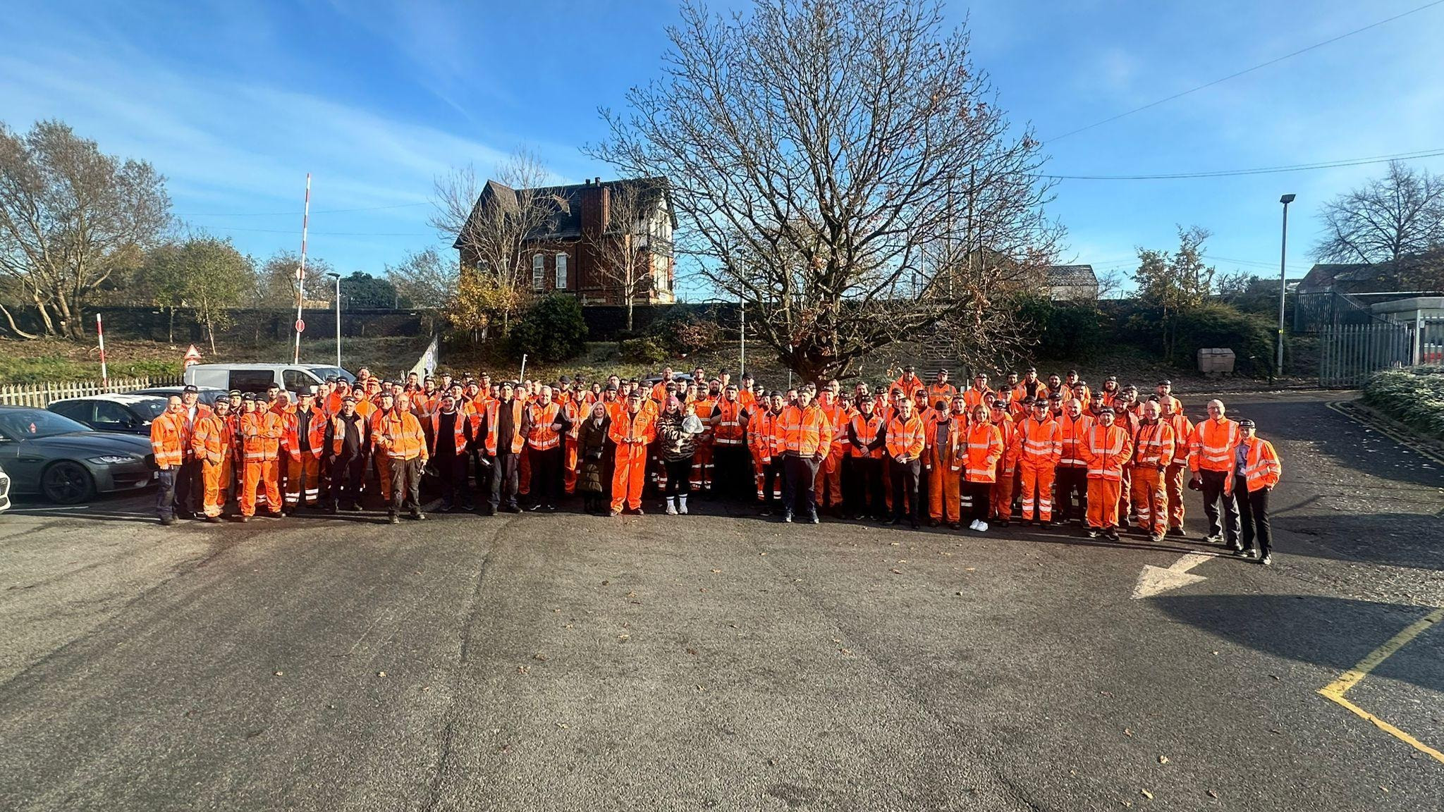 Image shows colleagues bidding farewell to Graham Hamlett