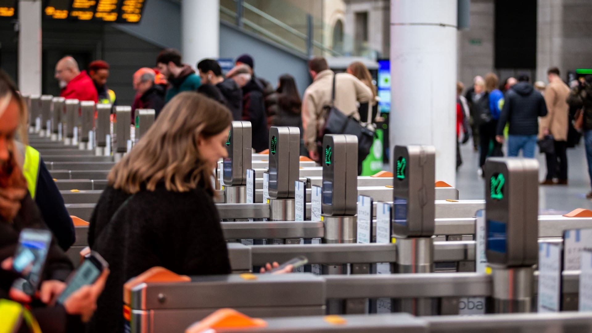 Image shows customer at ticket gateline