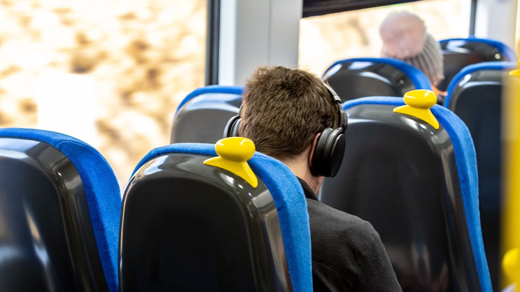 Image shows customer on-board a Northern train cropped