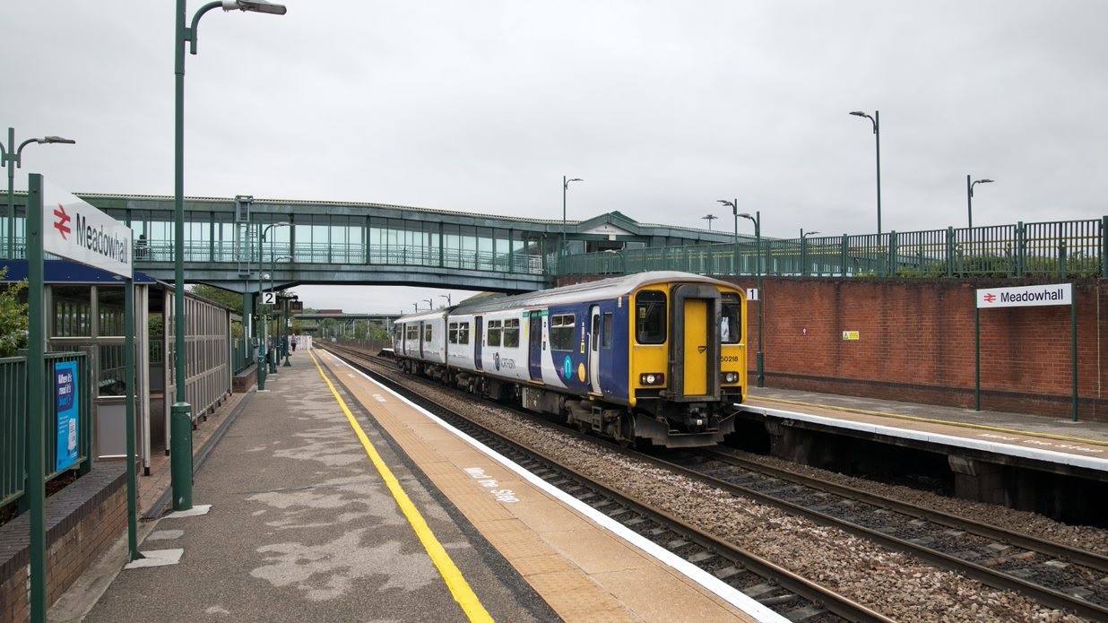This image shows a Northern train waiting at Meadowhall station