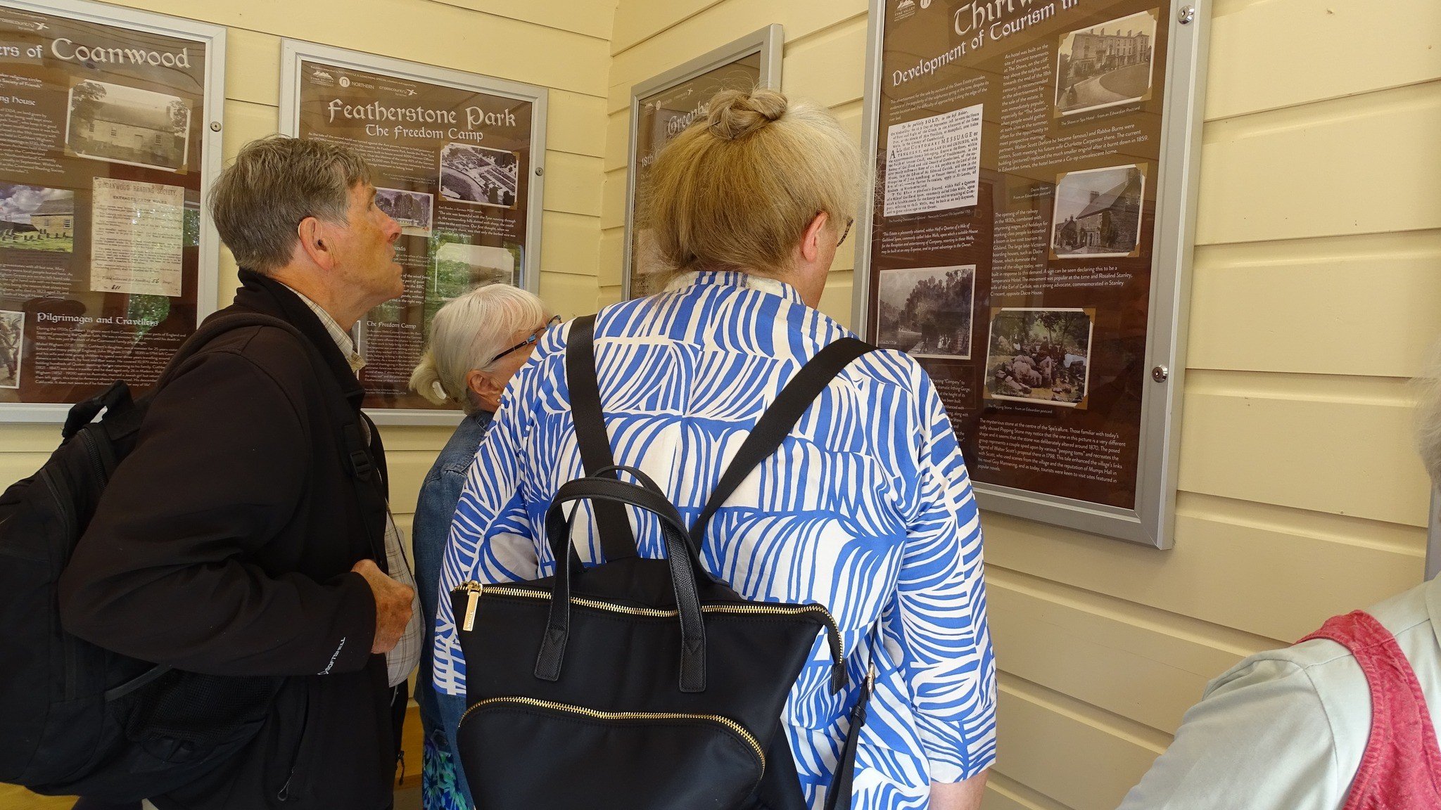 This image shows community members enjoying the new exhibition at Haltwhistle-2